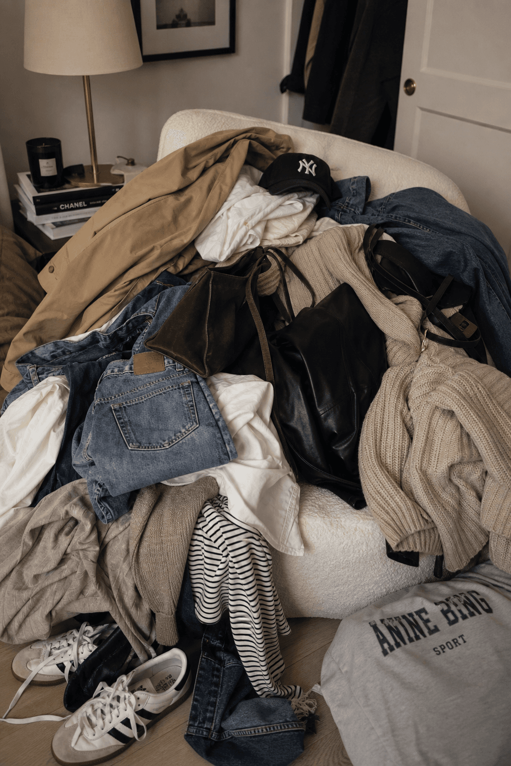 Clothes piled on a chair — before monia